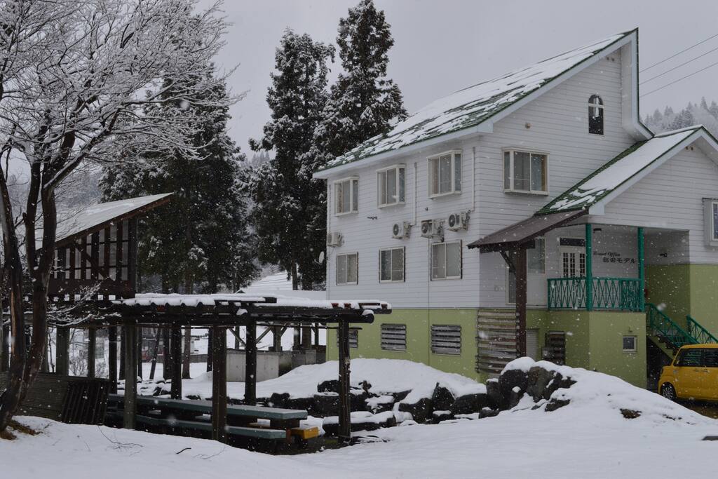 View of the building from the side first floor has a kareoke bar second floor has the lounge area and toilet and the third floor has all the rooms and a toilet.