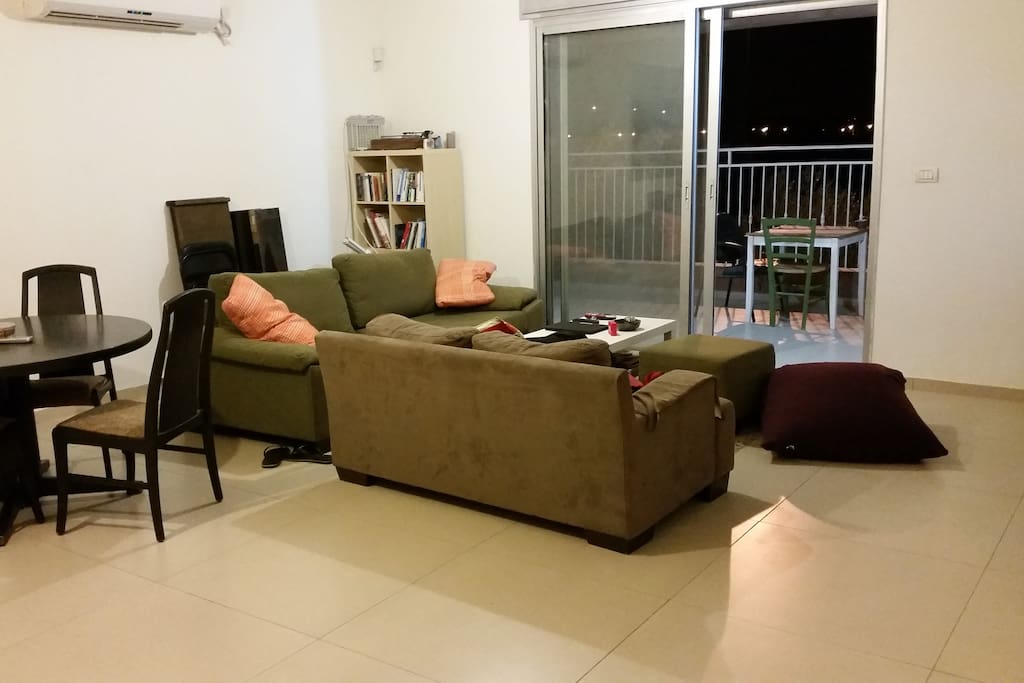 Saloon with open air country side view balcony