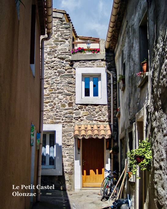 Exposed stone facade of property