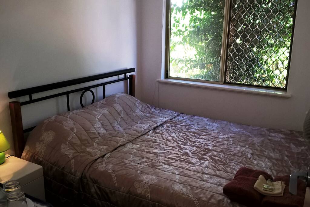 Comfortable room with queen-size bed, built in robe, desk, DVD player and WIFI