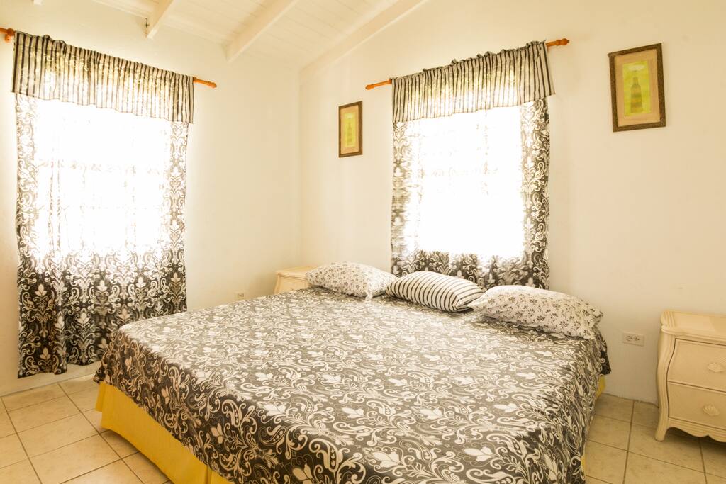 Room #1 has 2 twin beds that has been placed together to create a king size