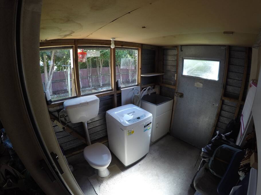 Own toilet with a shared laundry