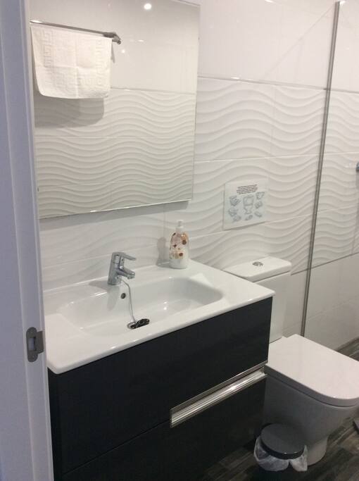 Two bathrooms have two cabinets draws with Mirror and powerful hair dryer supplied.