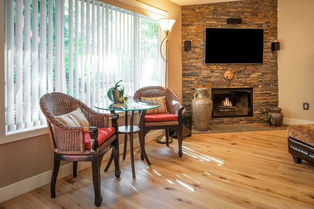 Bistro and fireplace with 55" TV