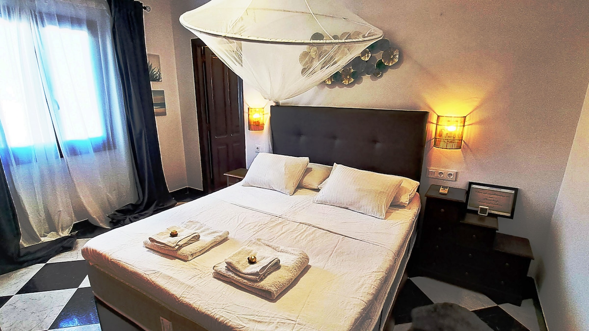 Chumba  "California" kilicho na bafu kwenye blanketi la
majira ya joto