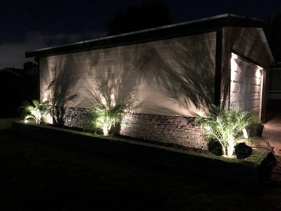 Front of house at night.