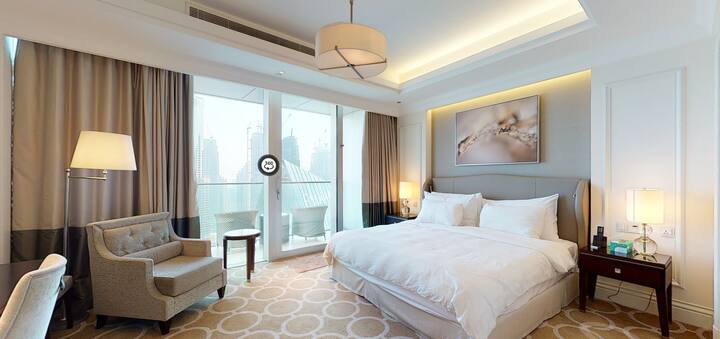 Master bedroom, fits for 2 people with a balcony facing the Burj and the fountain  