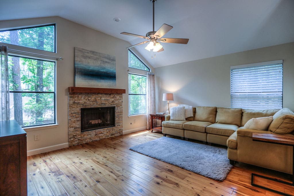 This home is nestled in one of the most popular Villages in The Woodlands, Grogan's Mill surrounded by trees.
