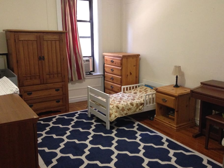 Large bedroom easily accommodates our queen size air mattress and/or kids in toddler bed and crib. Also: electric piano