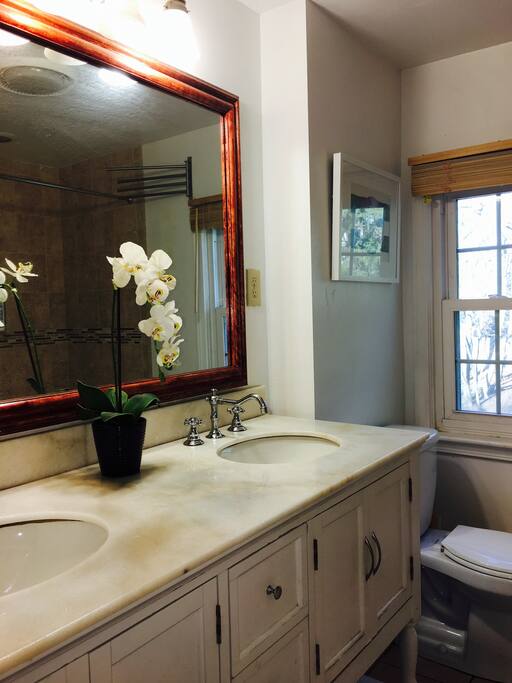 Full bath upstairs, with marble top vanity.