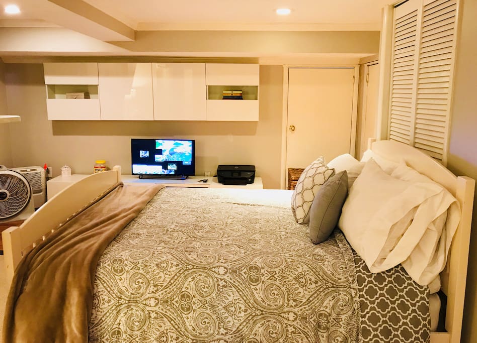 Queen size bed comfortably accommodates two