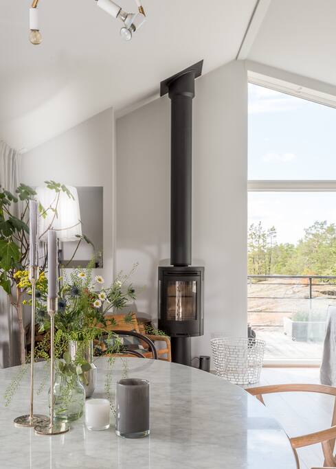 Cosy fireplace next to the dinning area