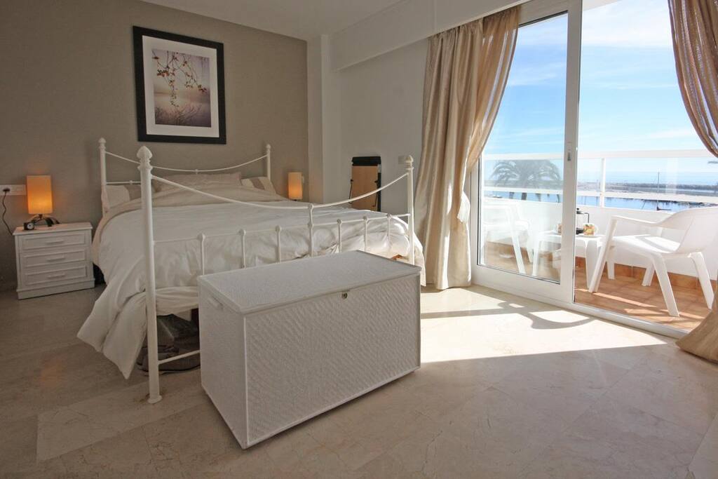 Master bedroom with en-suite bathroom and terrace with sea views