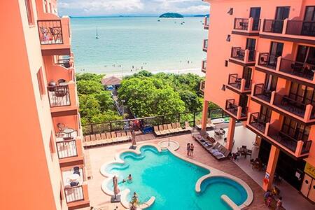 Suíte luxo 5 pessoas- pé na areia em Jurerê intern