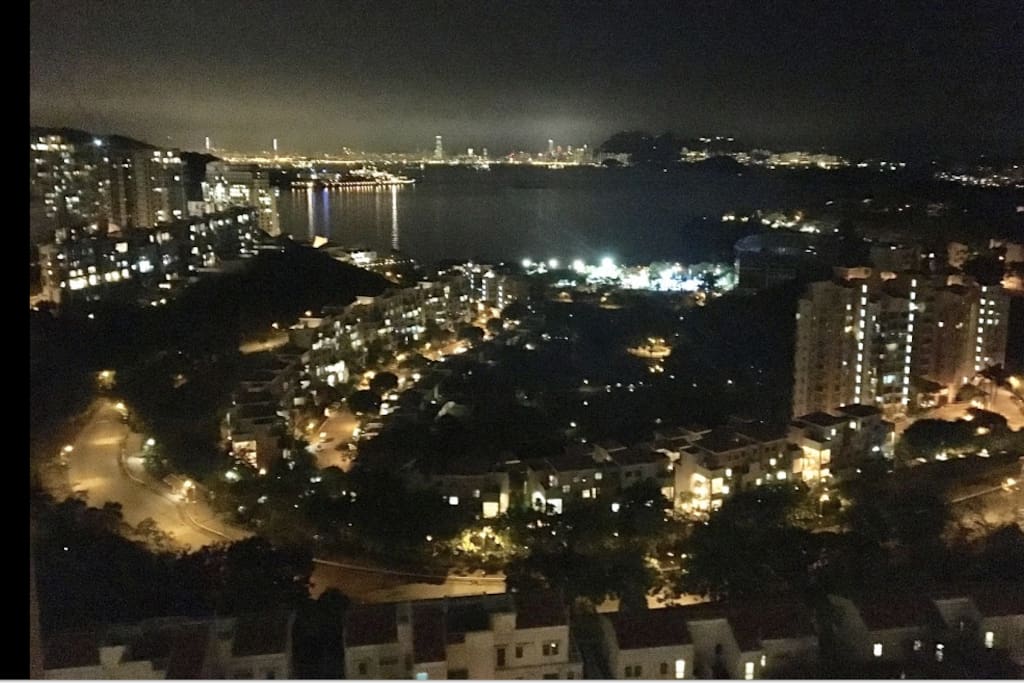 View of Hong Kong skyline at night - with free Disneyland fireworks every night!