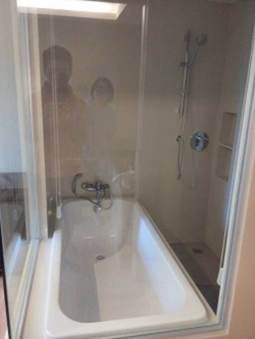 clean and nice bath room with bath tub.