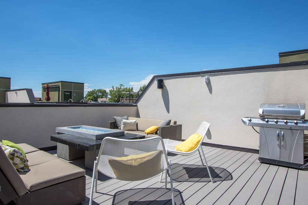 The private rooftop deck with grill, firepit, a couch, a day bed, and many chairs is always a favorite of my guests. Four outdoor speakers provide guests ability to play music outside as well (remember to please respect the neighbors!)