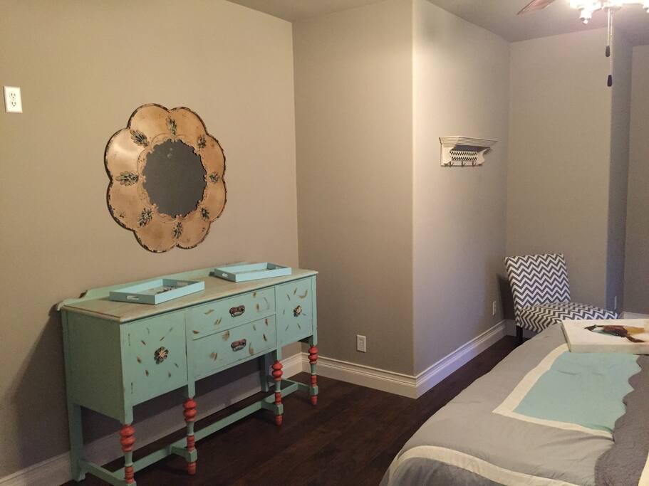 Master Bedroom 1 with custom repurposed antique dresser