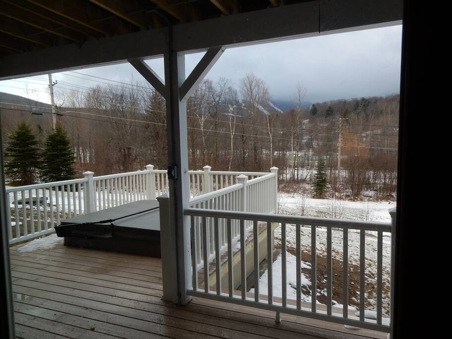 lower deck leading to hot tub