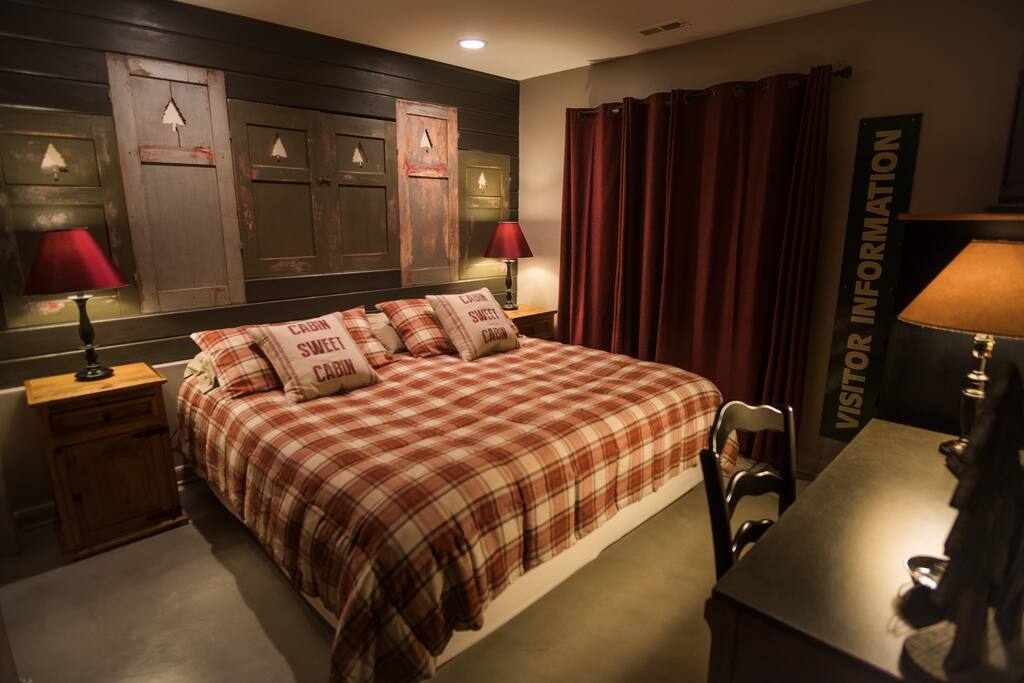 King size bed with slider out to yard and hot tub.