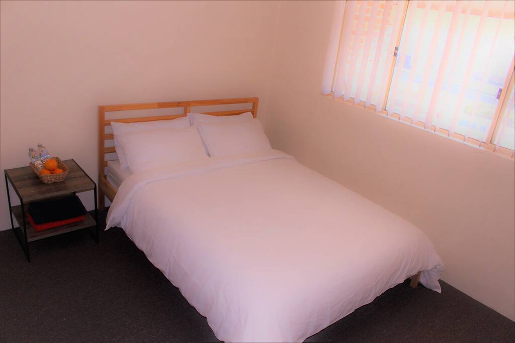Queen bed with new linens