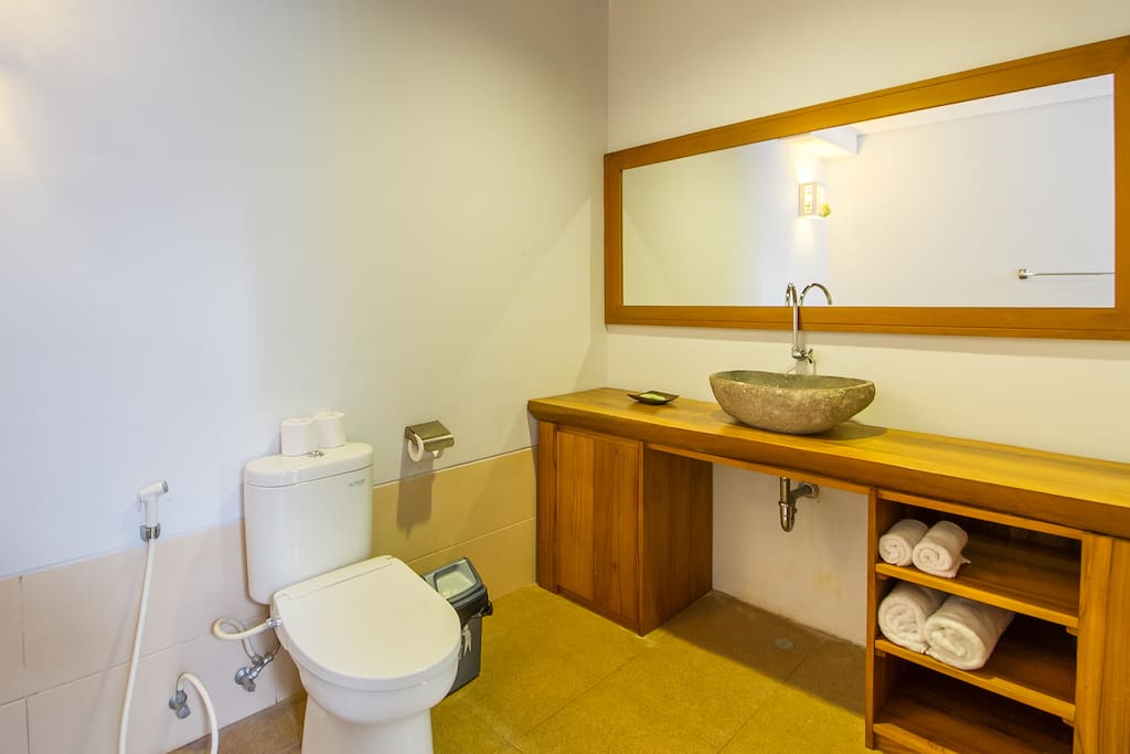 Your private spacious bathroom with amenities, towels and hot & cold water for shower.