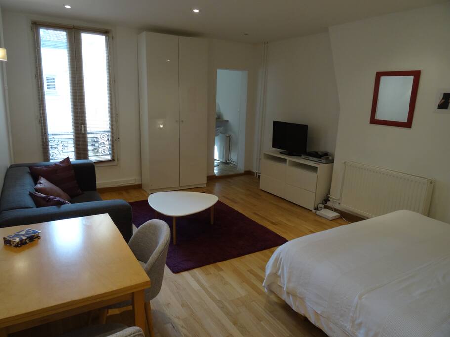 View of the main room from the front door. The window overlooks the courtyard