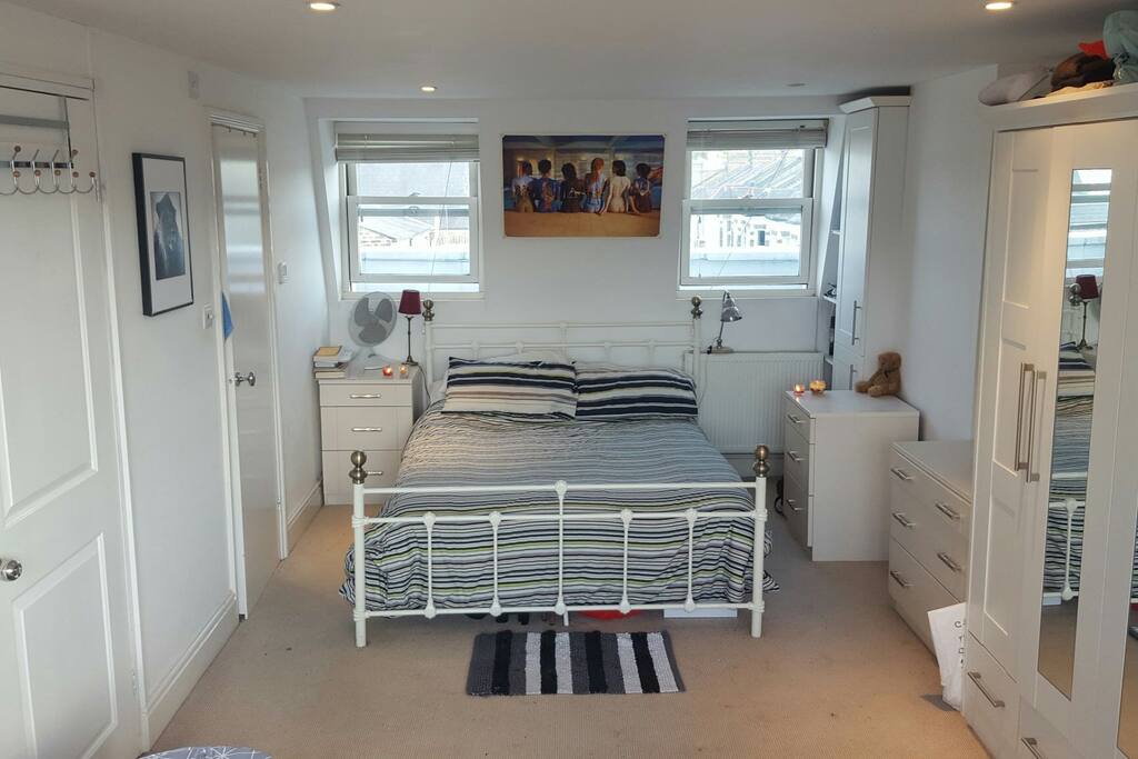 Huge bedroom full of light