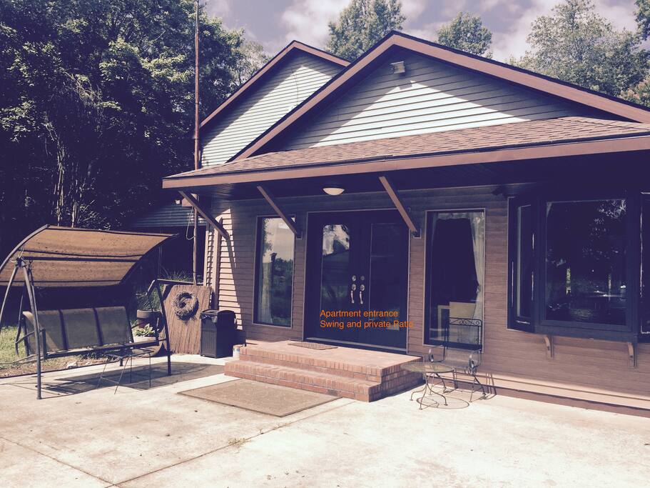 Private apartment entrance. Ready for fun with patio, BBQ grill, hammock & swing