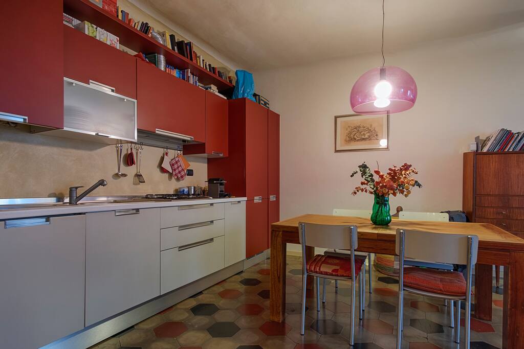 The kitchen and the living room on the left