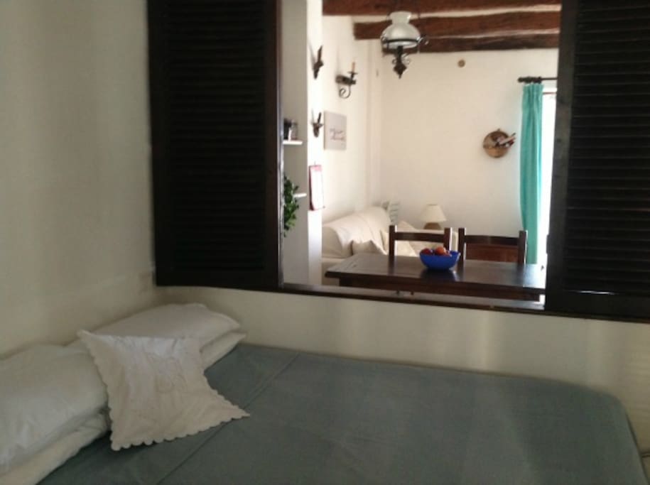 The view towards the front of the studio from the bedroom area