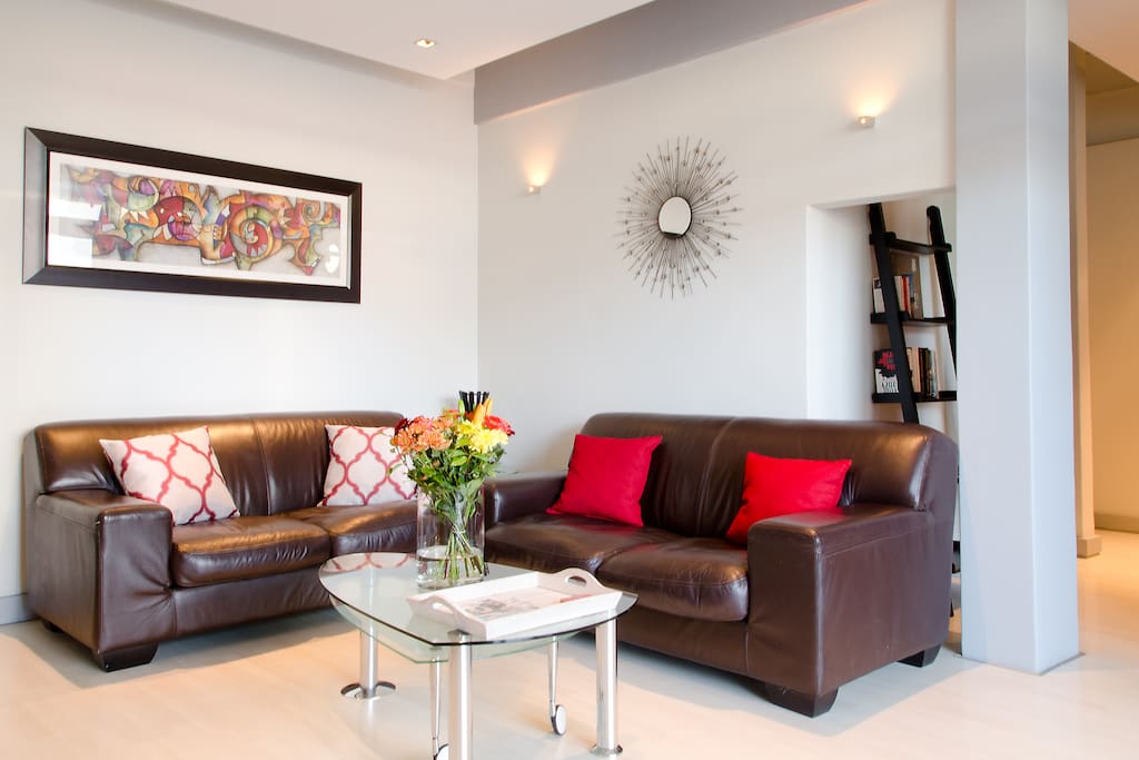 comfortable leather couches in light filled lounge