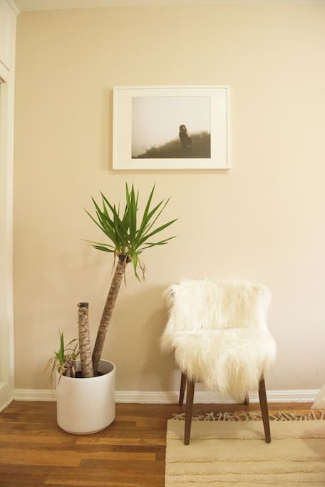 Reading corner with original photography by my husband.