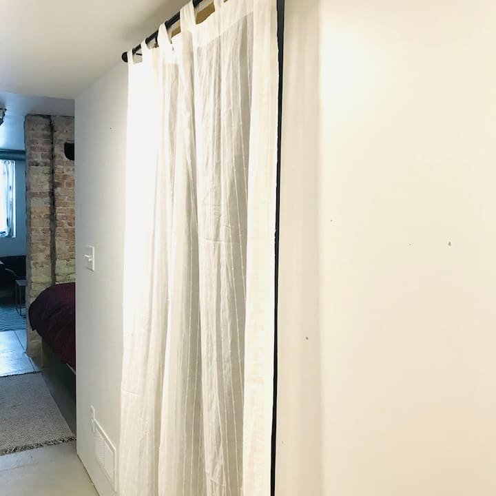 Doorway to bedroom with twin bed