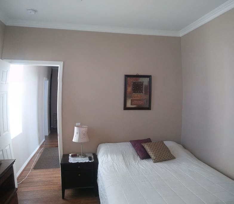 Bedroom and doorway to private bath