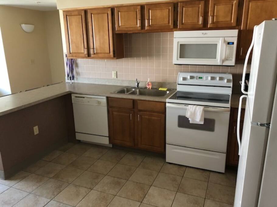 Includes stove, microwave, dishwasher, and full sized refrigerator