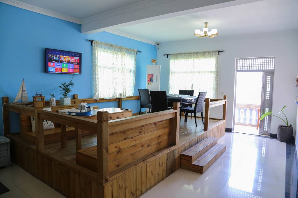 Living room featured with wooden sofa in the 3rd floor