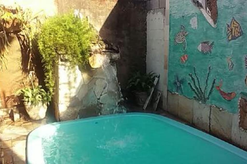 piscina privativa no fundos do quintal
