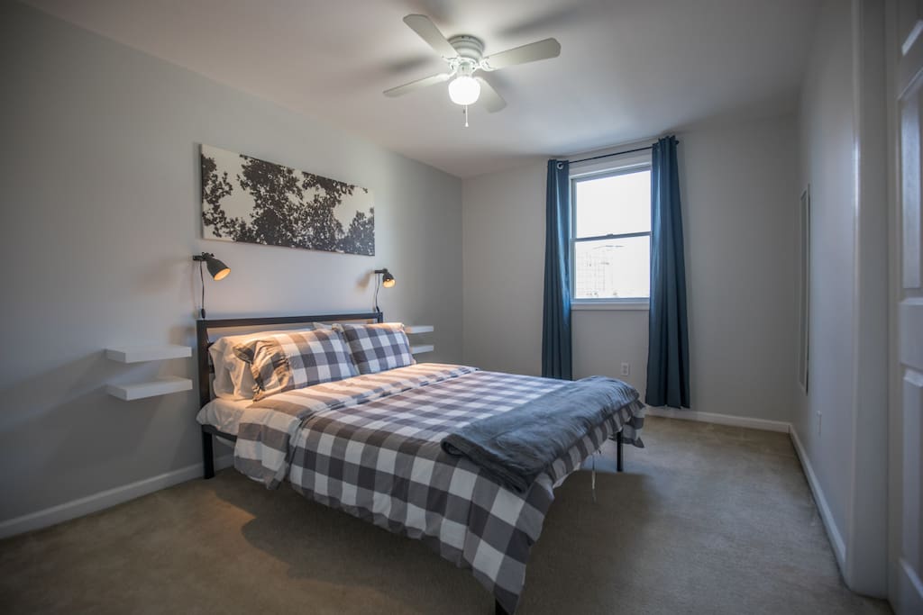 The Master bedroom is spacious and has excellent windows views of the downtown area