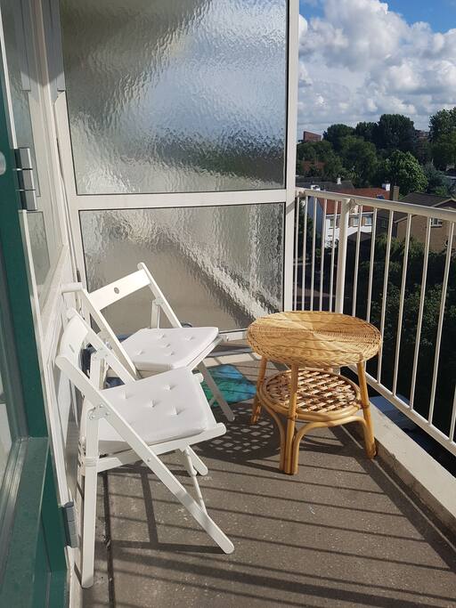 the room has an entrance to the balcony