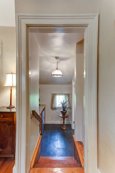A few steps lead down to the kitchenette and full bathroom.