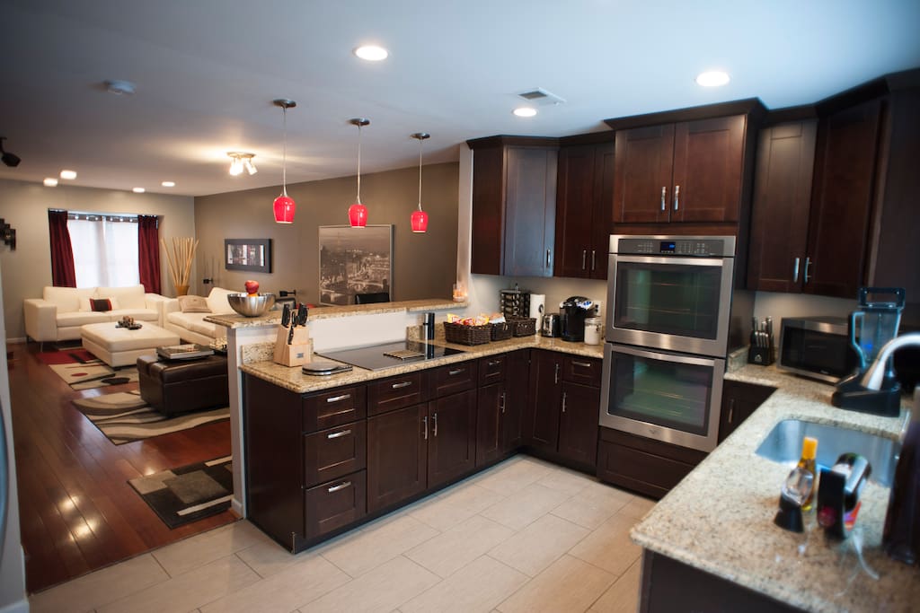 Gourmet kitchen with free k-cup coffee, oatmeal, tea, snacks, hot cocoa, and other snacks