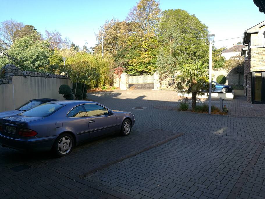 Front door two car park spaces and electric gates