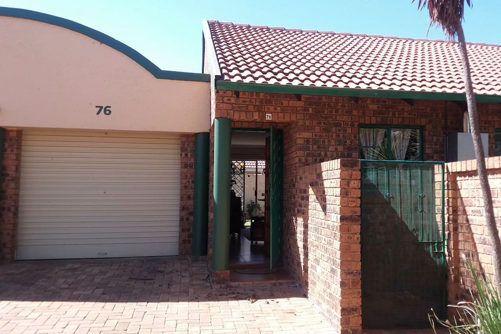 Front of house, private entrance with parking space.