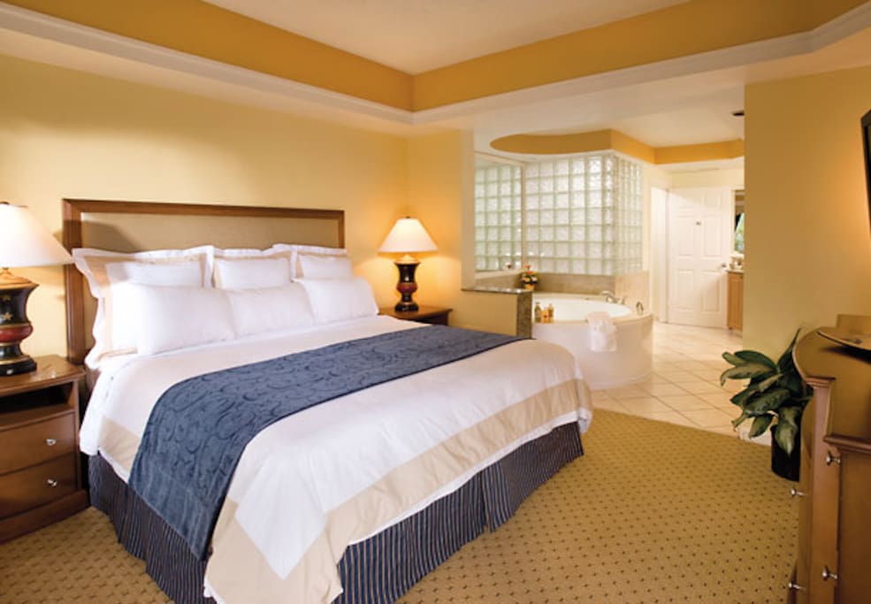 Master suite with king bed and luxurious whirlpool tub