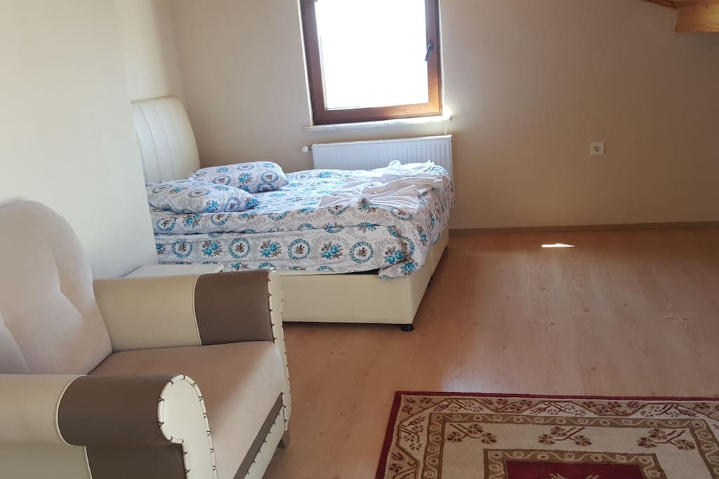 A double bed in upstair bedroom.