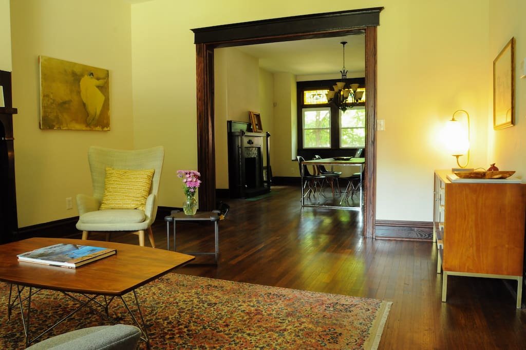 Living room and dining room.
All the way to the back is a fantastic little window seat. Perfect for coffee in the morning.