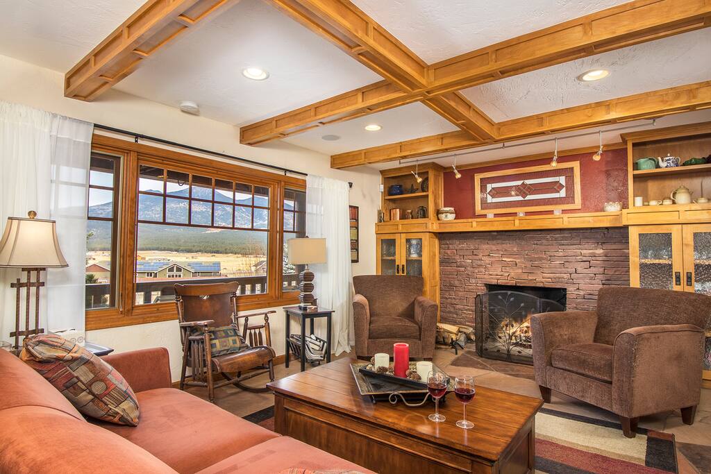 Gather in the parlor with your favorite beverages to take in the views, or play some board games provided for guests' use. If you'd like a fire in the fireplace, your hosts will be happy to assist. This is space set aside for guests, although you may be visited our cats.