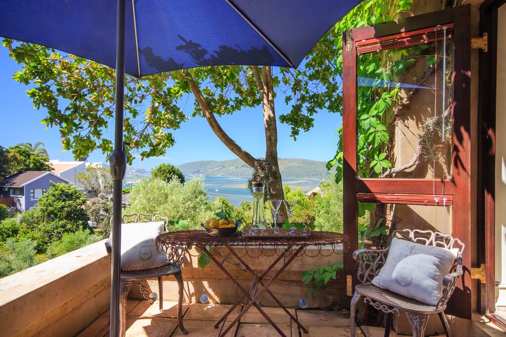 Private patio with views of lagoon and olive grove