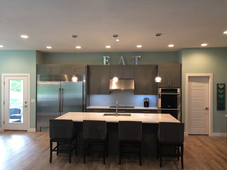 Eat in kitchen, 12 foot island and 60 in refrigerator-freezer